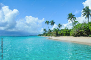 The clouds are coming on the white Caribbean beach