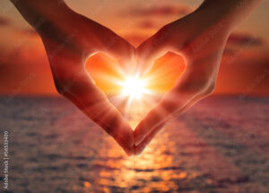 sunset in heart hands
