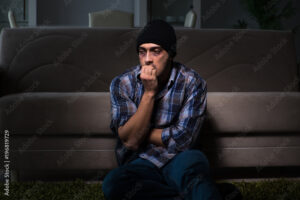 Young man in agony having problems with narcotics