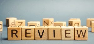 Wooden blocks with the word Review. Customer review concept. Reviewing, auditing, reviewer. Service rating. Feedback.