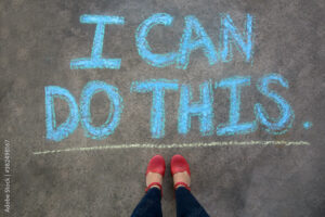 Female standing over a message saying I CAN DO THIS