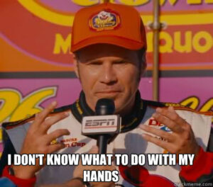 Ricky Bobby awkwardly doesn't know what to do with his hands