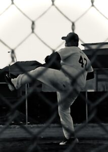 a black and white photo of me pitching