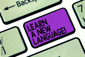 Text sign showing Learn A New Language. Conceptual photo Study Words other than the Native Mother Tongue Keyboard key Intention to create computer message pressing keypad idea
