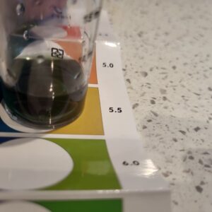 pH test of Tower Garden Water with pH colour scale