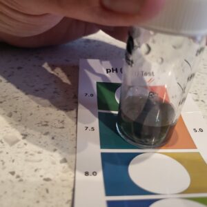 pH test of Tower Garden Water with pH colour scale