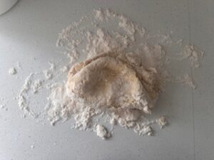 kneading pasta dough