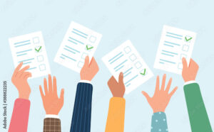 Voting concept. People s hands holding vote ballots.