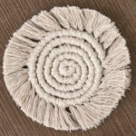Macramé cup coaster.