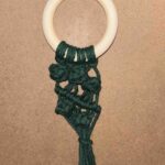 Berry knot with a row of double half hitch knot. 