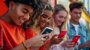 A photo capturing young people absorbed in their smartphones