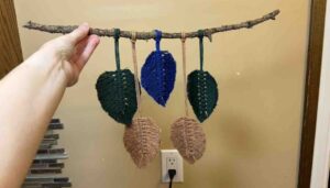 Completed macramé leaf hanging.
