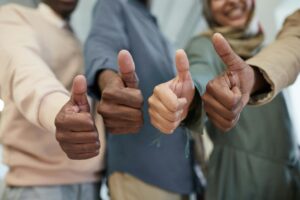 People doing thumbs up