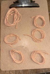 Tan cord measured out. 