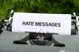 typewriter, hate messages, hatred