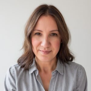 A headshot of the author of the blog, Rhonda. 