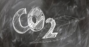 A drawing of co2, carbon dioxide on the chalkboard.