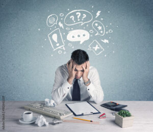 Business person in doubt and confused