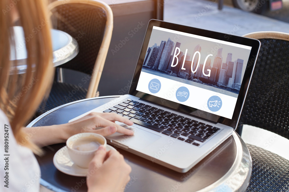 woman reading blog online on computer